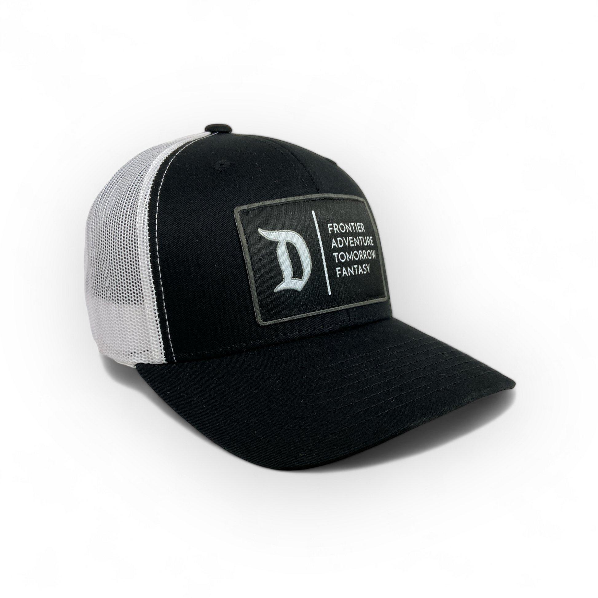 side view of black and white four lands hat